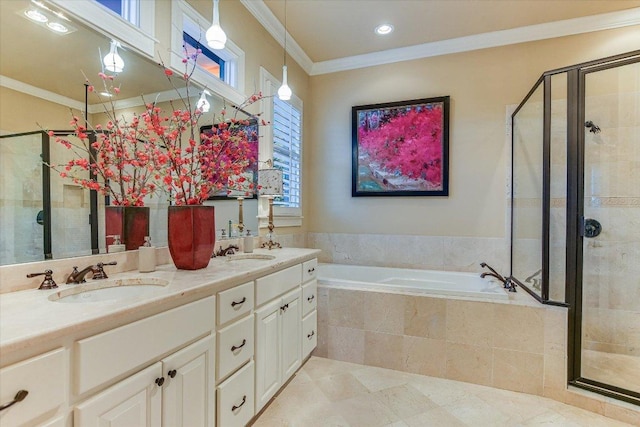 full bath with ornamental molding, a sink, a shower stall, and a bath