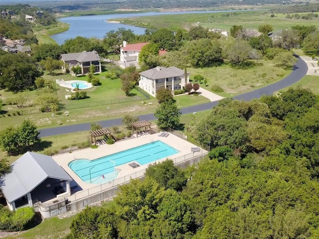 birds eye view of property featuring a water view