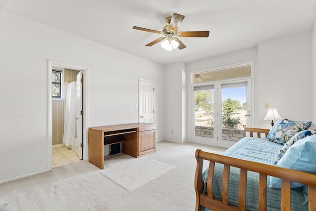 1306 Far W Rd, Horseshoe Bay, TX 78657 - bedroom with access to outside, light colored carpet, a desk, ceiling fan, and ensuite bath