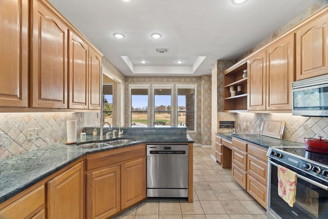 1306 Far W Rd, Horseshoe Bay, TX 78657 - kitchen featuring stainless steel appliances, open shelves, dark stone counters, light tile patterned flooring, and decorative backsplash