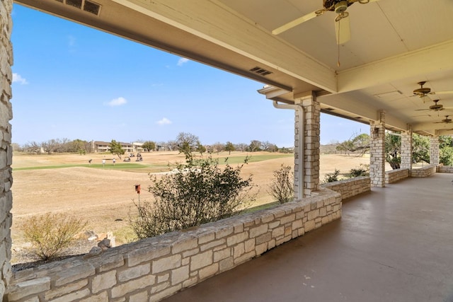 1306 Far W Rd, Horseshoe Bay, TX 78657 - view of patio / terrace with a ceiling fan and view of golf course