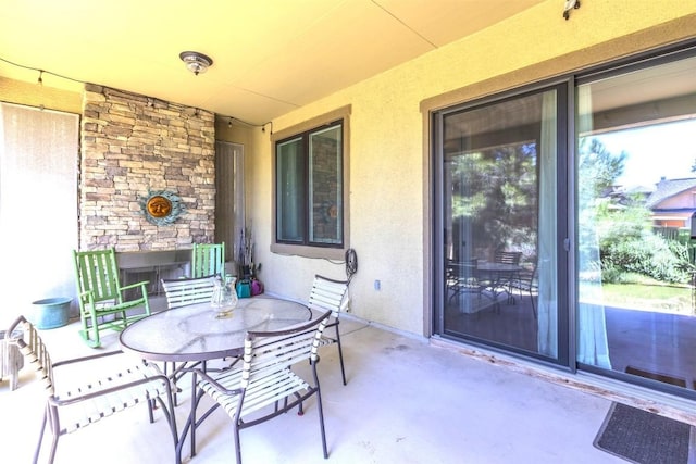 view of patio with outdoor dining area