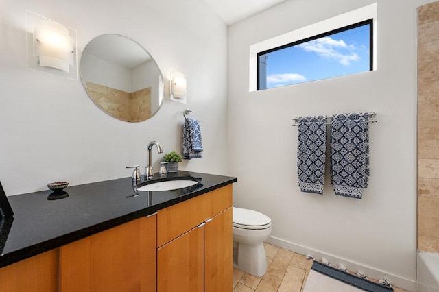 bathroom with walk in shower, a bathing tub, vanity, and toilet