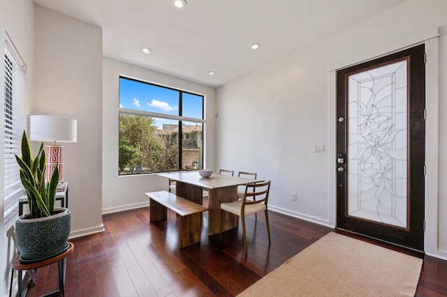 dining space featuring dark wood-style floors, recessed lighting, and baseboards