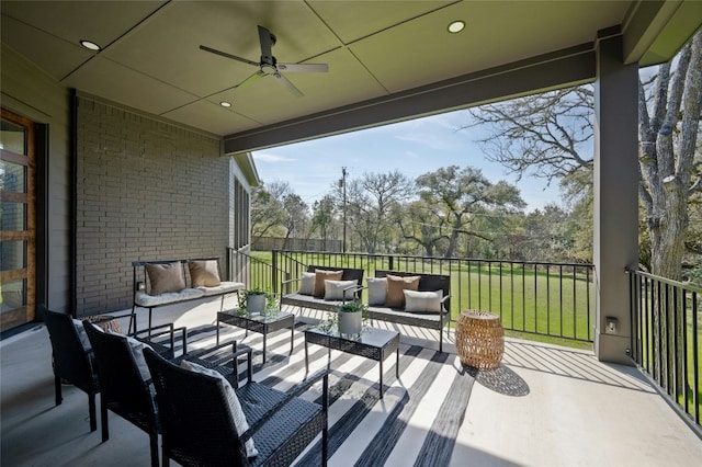 exterior space with an outdoor living space and a ceiling fan