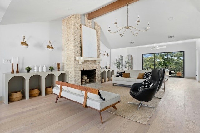 living area with visible vents, light wood-style flooring, a brick fireplace, high vaulted ceiling, and beam ceiling