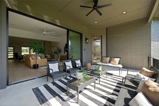 view of patio / terrace featuring an outdoor hangout area and a ceiling fan