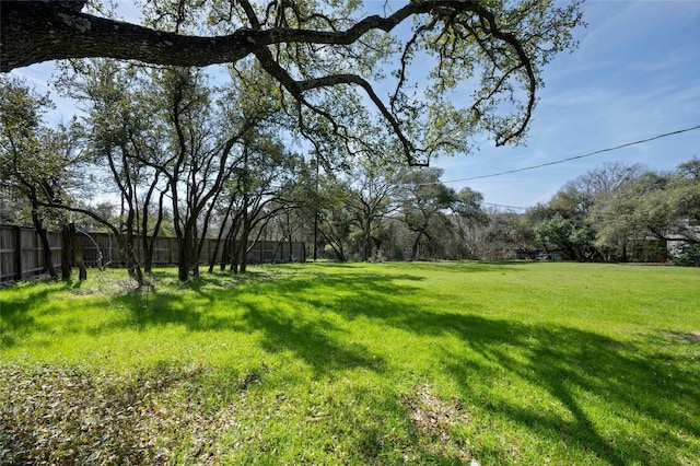 view of yard with fence