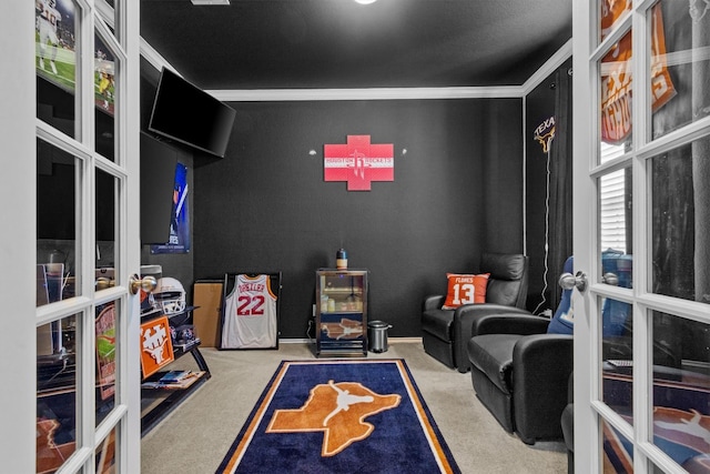 game room featuring baseboards, french doors, carpet, and crown molding