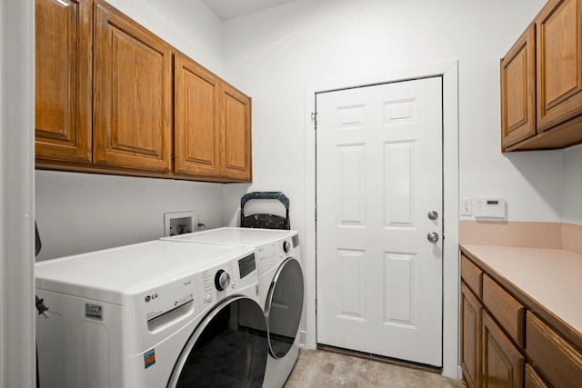 3660 Stagecoach Ranch Loop, Dripping Springs, TX 78620 - laundry room with cabinet space and washing machine and clothes dryer