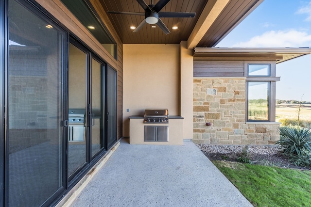 view of patio / terrace featuring grilling area, area for grilling, and a ceiling fan