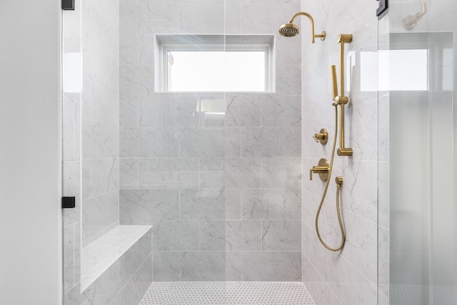 full bathroom featuring a shower stall