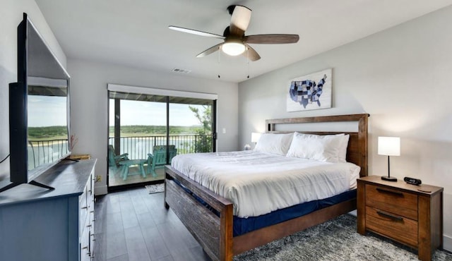 bedroom with access to exterior, ceiling fan, visible vents, and wood finished floors