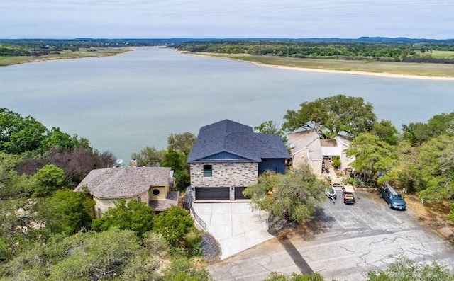 bird's eye view with a water view