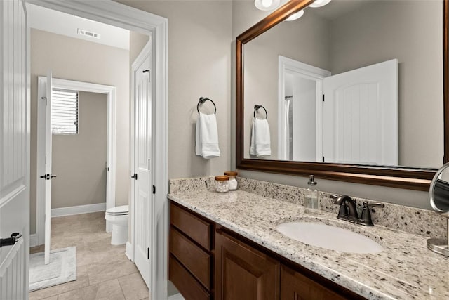 full bathroom with visible vents, toilet, vanity, tile patterned flooring, and baseboards