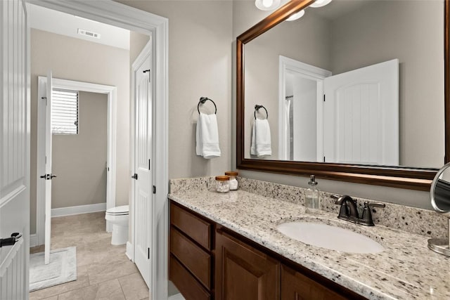 full bathroom featuring visible vents, tile patterned flooring, vanity, toilet, and baseboards