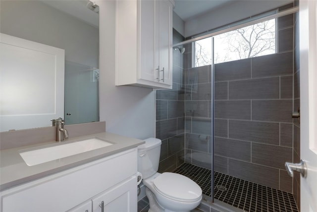 6902 Carver Ave Unit B, Austin, TX 78752 - bathroom with vanity, a shower stall, and toilet