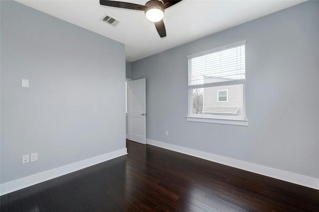 6902 Carver Ave Unit B, Austin, TX 78752 - empty room with ceiling fan, baseboards, and dark wood-style floors