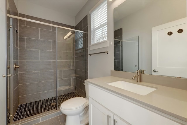6902 Carver Ave Unit B, Austin, TX 78752 - full bath featuring vanity, toilet, a stall shower, and tile patterned floors