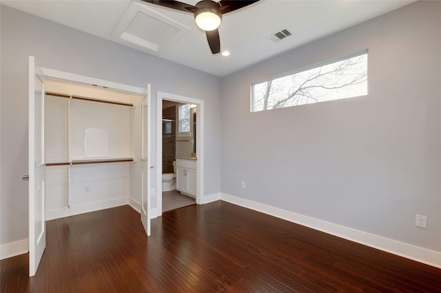 6902 Carver Ave Unit B, Austin, TX 78752 - unfurnished bedroom with dark wood-style flooring, baseboards, ensuite bathroom, ceiling fan, and recessed lighting