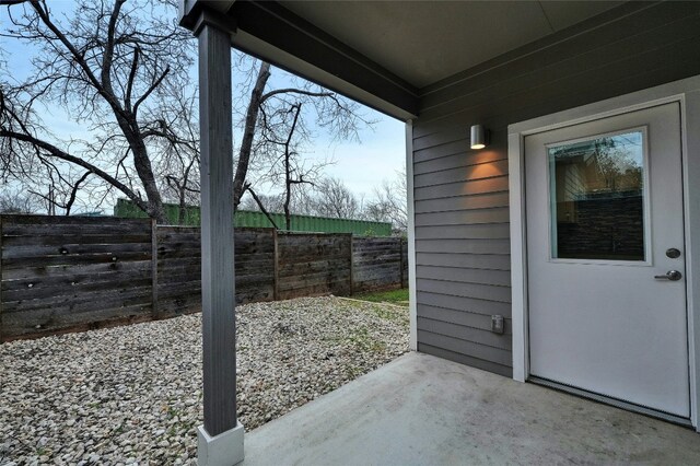6902 Carver Ave Unit B, Austin, TX 78752 - fenced backyard featuring a patio