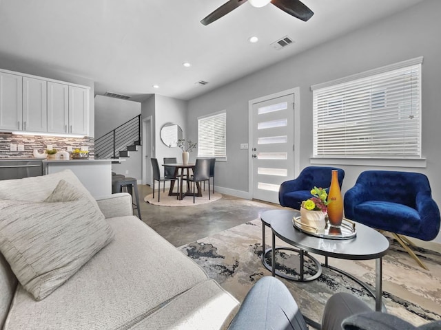 6902 Carver Ave Unit B, Austin, TX 78752 - living area with stairs, finished concrete floors, a ceiling fan, recessed lighting, and baseboards