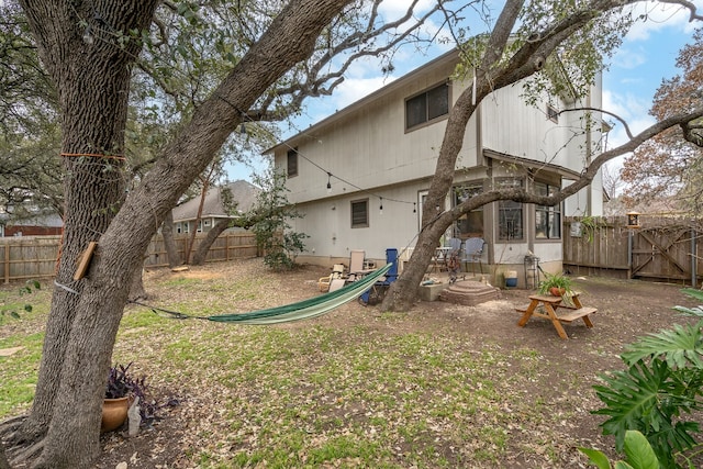 exterior space with a fenced backyard