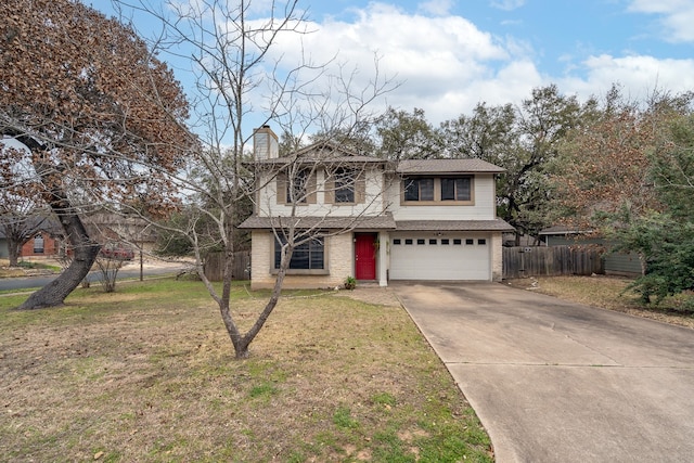 traditional home with concrete driveway, a chimney, an attached garage, fence, and a front yard