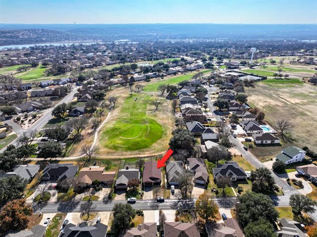 birds eye view of property featuring a residential view and golf course view