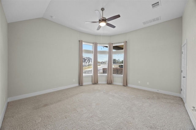 unfurnished room with visible vents, ceiling fan, light carpet, and baseboards