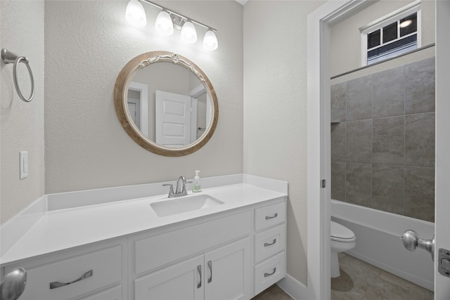 full bathroom with tile patterned flooring, vanity, and toilet