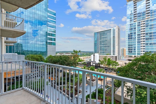 balcony featuring a city view