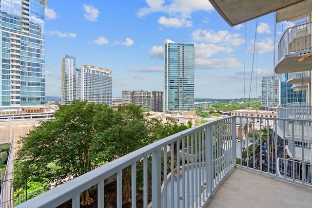 balcony featuring a view of city