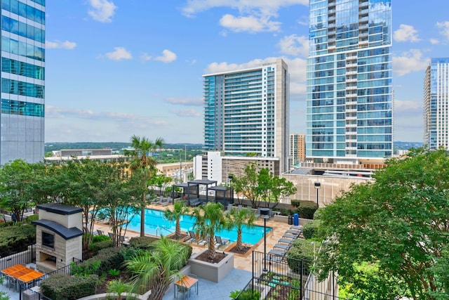 community pool featuring a city view