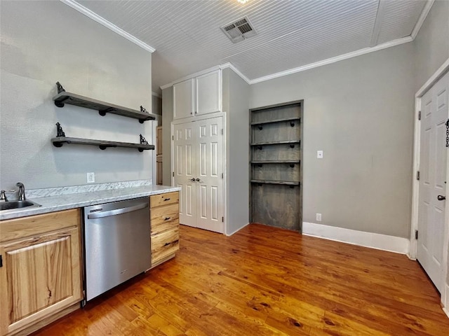 908 W Hopkins St, San Marcos, TX 78666 - kitchen with stainless steel dishwasher, ornamental molding, light wood-type flooring, light countertops, and open shelves