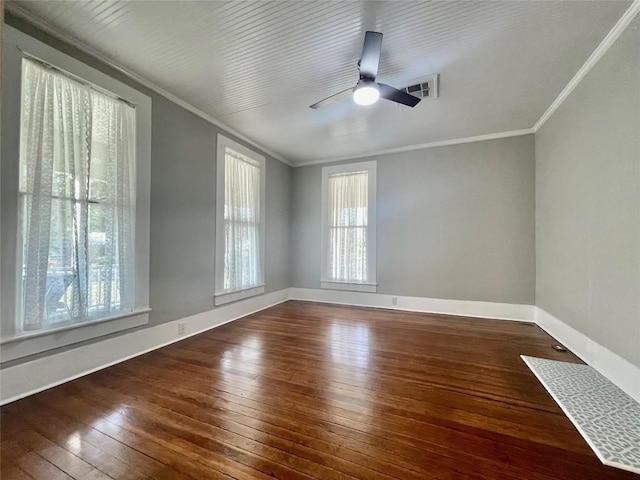 908 W Hopkins St, San Marcos, TX 78666 - empty room featuring wood-type flooring, crown molding, ceiling fan, and baseboards