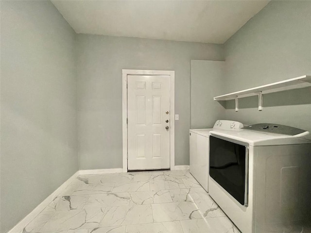 908 W Hopkins St, San Marcos, TX 78666 - laundry area featuring separate washer and dryer, light marble finish floors, and baseboards
