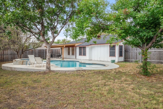 view of pool with a patio area, a fenced backyard, a fenced in pool, and a lawn