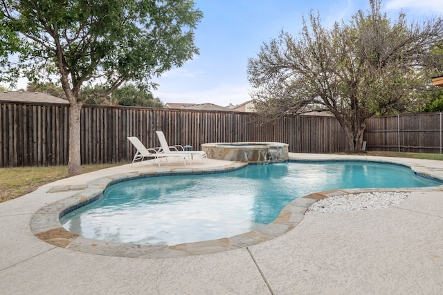 view of swimming pool with a fenced in pool, a fenced backyard, a patio, and an in ground hot tub