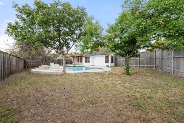 view of yard with a patio and a fenced backyard