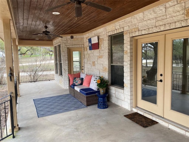 view of patio / terrace featuring french doors and a ceiling fan