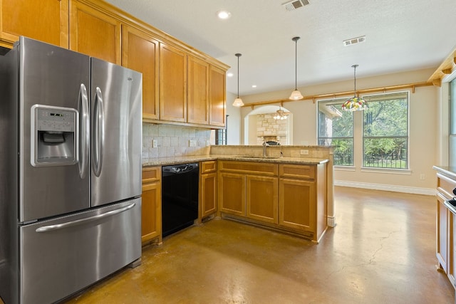 kitchen with concrete floors, a sink, black dishwasher, stainless steel fridge with ice dispenser, and tasteful backsplash