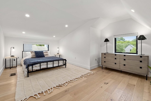 1706 Goodrich Ave Unit A, Austin, TX 78704 - bedroom with light wood-type flooring, recessed lighting, and vaulted ceiling