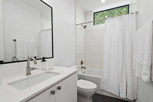 1706 Goodrich Ave Unit A, Austin, TX 78704 - bathroom featuring vanity, shower / bath combo with shower curtain, and recessed lighting