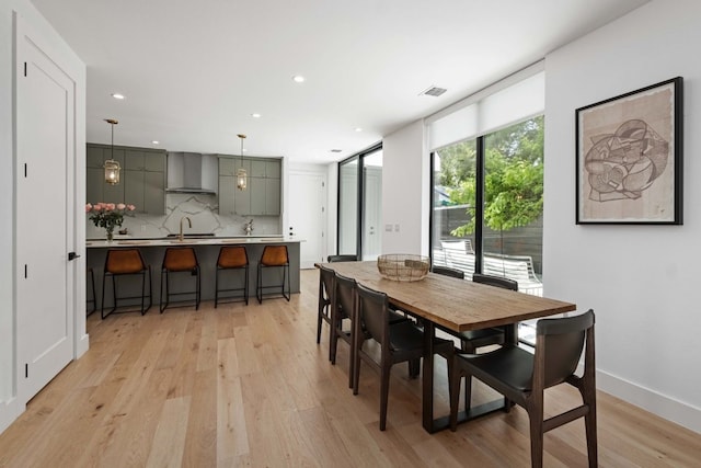 1706 Goodrich Ave Unit A, Austin, TX 78704 - dining space with light wood finished floors and recessed lighting