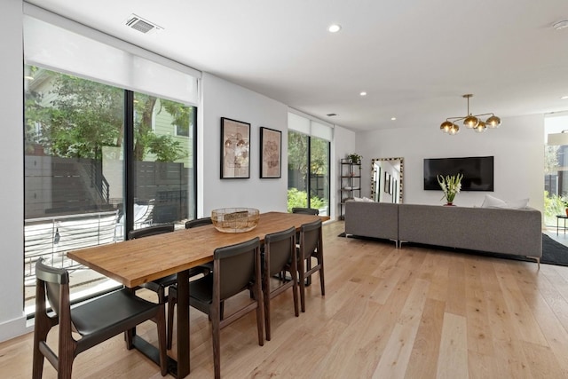1706 Goodrich Ave Unit A, Austin, TX 78704 - dining room featuring recessed lighting, light wood-style floors, and a chandelier