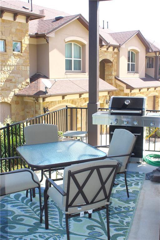 exterior space with a grill and outdoor dining space