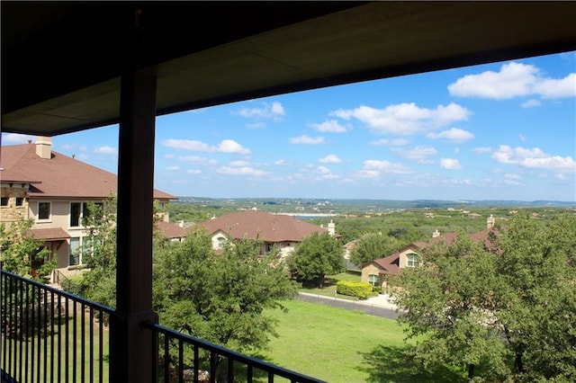 balcony featuring a residential view