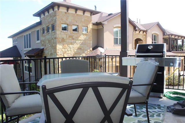 balcony featuring outdoor dining area