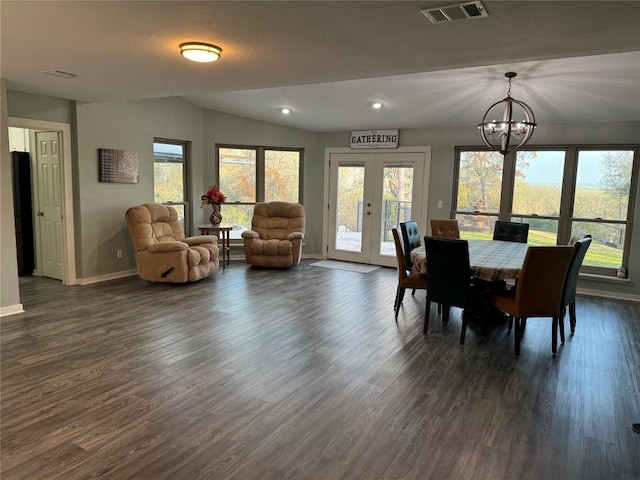 dining room featuring visible vents, dark wood-style flooring, and french doors